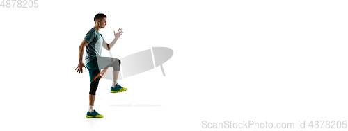 Image of Young caucasian male model in action, motion isolated on white background. Concept of sport, movement, energy and dynamic, healthy lifestyle. Training, practicing.