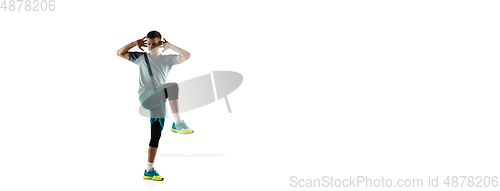 Image of Young caucasian male model in action, motion isolated on white background. Concept of sport, movement, energy and dynamic, healthy lifestyle. Training, practicing.