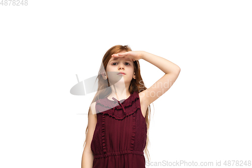 Image of Happy caucasian little girl isolated on white studio background. Looks happy, cheerful, sincere. Copyspace. Childhood, education, emotions concept