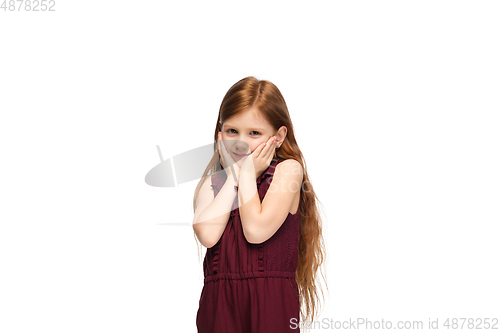 Image of Happy caucasian little girl isolated on white studio background. Looks happy, cheerful, sincere. Copyspace. Childhood, education, emotions concept