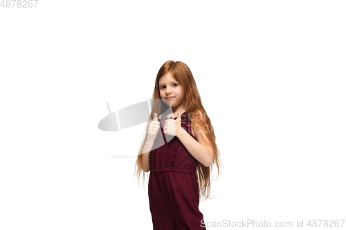 Image of Happy caucasian little girl isolated on white studio background. Looks happy, cheerful, sincere. Copyspace. Childhood, education, emotions concept