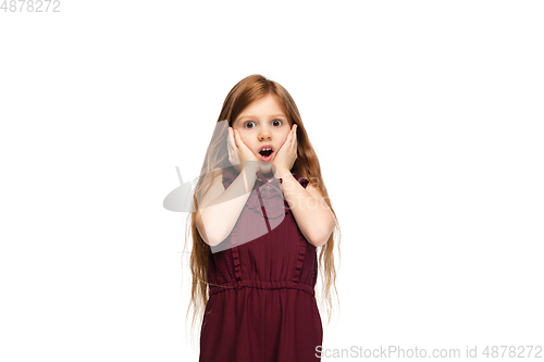 Image of Happy caucasian little girl isolated on white studio background. Looks happy, cheerful, sincere. Copyspace. Childhood, education, emotions concept