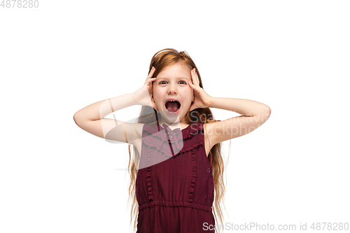 Image of Happy caucasian little girl isolated on white studio background. Looks happy, cheerful, sincere. Copyspace. Childhood, education, emotions concept