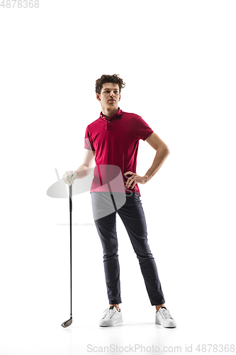 Image of Golf player in a red shirt training, practicing isolated on white studio background