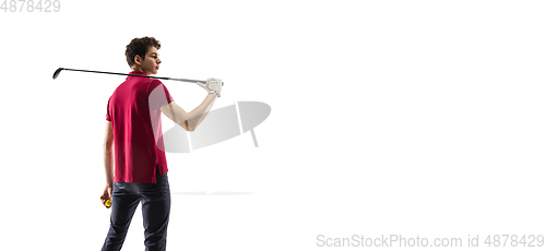 Image of Golf player in a red shirt training, practicing isolated on white studio background