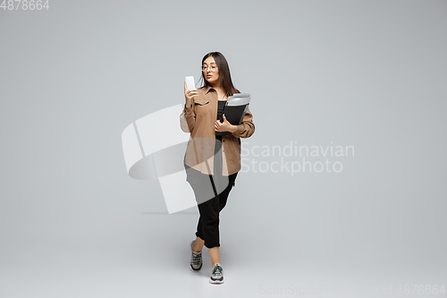 Image of Young caucasian woman in casual wear. Bodypositive female character, plus size businesswoman