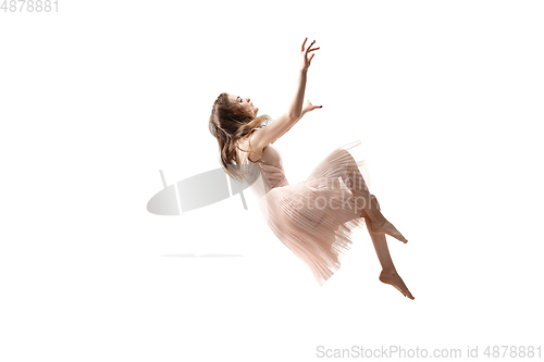 Image of Mid-air beauty. Full length studio shot of attractive young woman hovering in air and keeping eyes closed