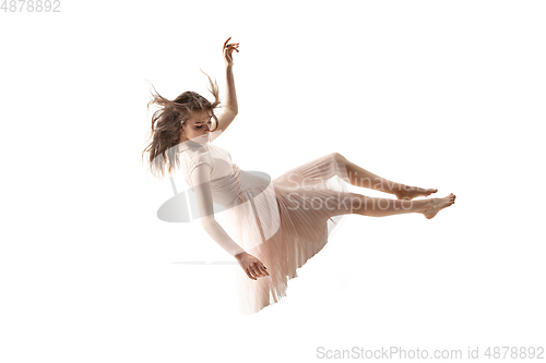 Image of Mid-air beauty. Full length studio shot of attractive young woman hovering in air and keeping eyes closed