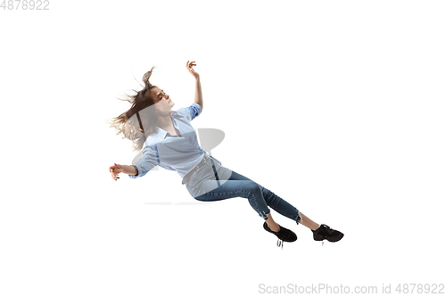 Image of Mid-air beauty. Full length studio shot of attractive young woman hovering in air and keeping eyes closed