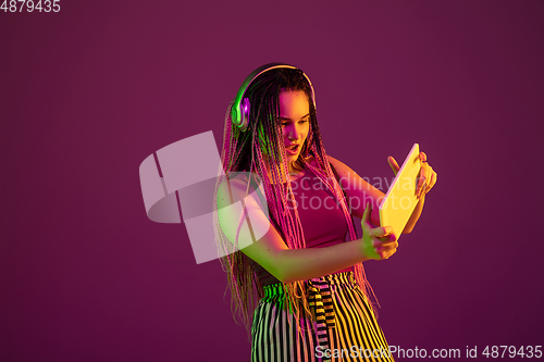 Image of Portrait of young caucasian woman on pink background with copyspace, unusual and freaky appearance