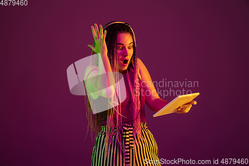 Image of Portrait of young caucasian woman on pink background with copyspace, unusual and freaky appearance