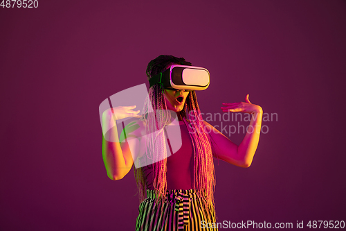 Image of Portrait of young caucasian woman on pink background with copyspace, unusual and freaky appearance