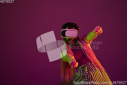 Image of Portrait of young caucasian woman on pink background with copyspace, unusual and freaky appearance