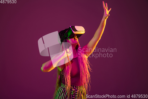 Image of Portrait of young caucasian woman on pink background with copyspace, unusual and freaky appearance