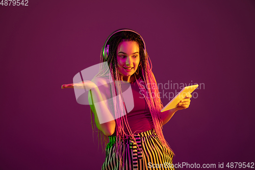 Image of Portrait of young caucasian woman on pink background with copyspace, unusual and freaky appearance