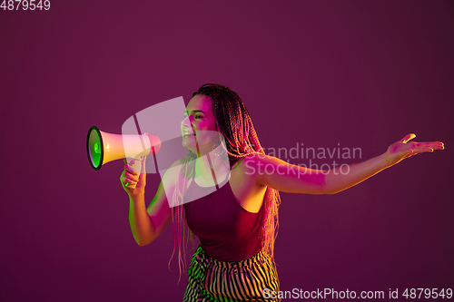 Image of Portrait of young caucasian woman on pink background with copyspace, unusual and freaky appearance