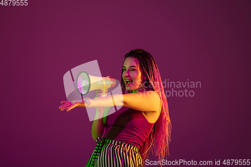 Image of Portrait of young caucasian woman on pink background with copyspace, unusual and freaky appearance