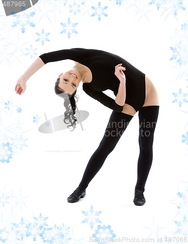 Image of fitness instructor in black leotard