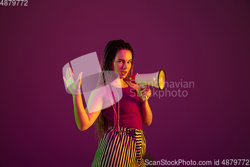 Image of Portrait of young caucasian woman on pink background with copyspace, unusual and freaky appearance