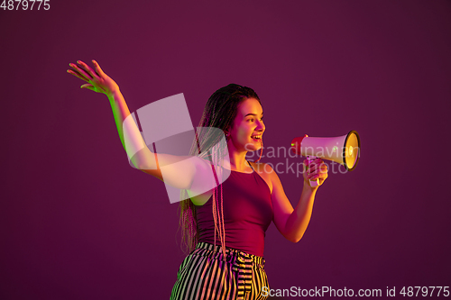 Image of Portrait of young caucasian woman on pink background with copyspace, unusual and freaky appearance