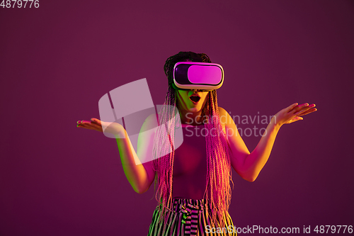 Image of Portrait of young caucasian woman on pink background with copyspace, unusual and freaky appearance