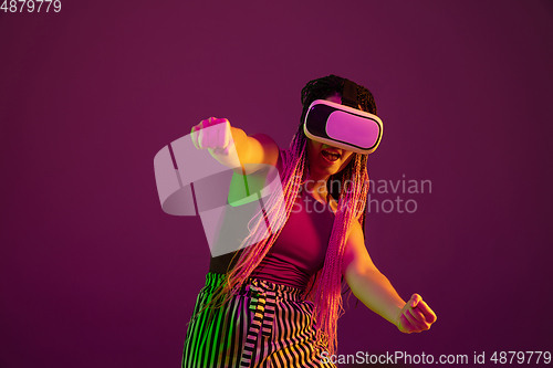 Image of Portrait of young caucasian woman on pink background with copyspace, unusual and freaky appearance