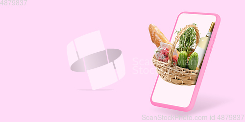 Image of Home delivery, food purchase via the Internet. Your smartphone or other gadget - all you need for food arriving to any address