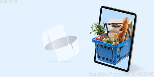 Image of Home delivery, food purchase via the Internet. Your smartphone or other gadget - all you need for food arriving to any address