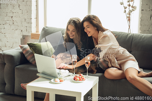 Image of Caucasian young and happy friends enjoying a weekend, little hen-party together