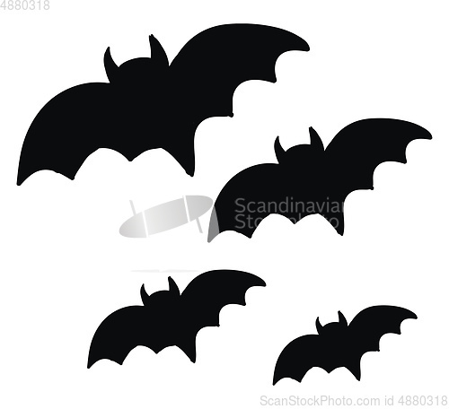 Image of Four black bats flying in the sky vector or color illustration
