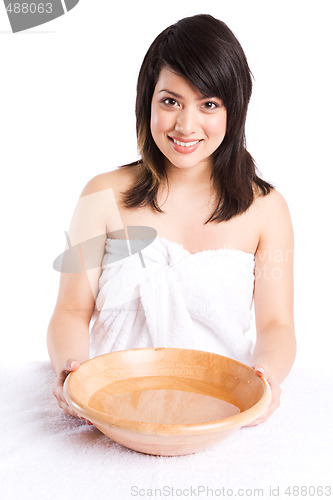 Image of Beautiful asian girl washing face