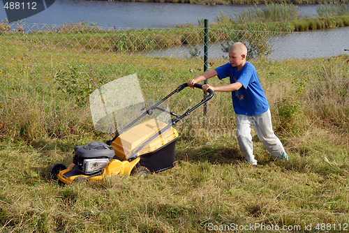 Image of mowing grass