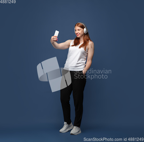 Image of Young caucasian woman in casual wear. Bodypositive female character, plus size businesswoman