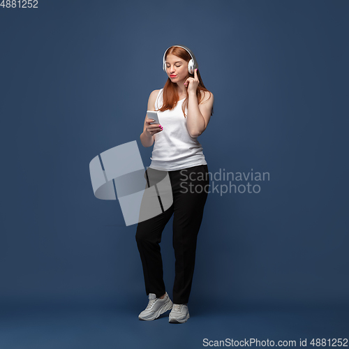 Image of Young caucasian woman in casual wear. Bodypositive female character, plus size businesswoman