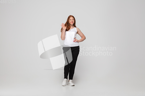 Image of Young caucasian woman in casual wear. Bodypositive female character, plus size businesswoman