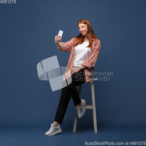 Image of Young caucasian woman in casual wear. Bodypositive female character, plus size businesswoman