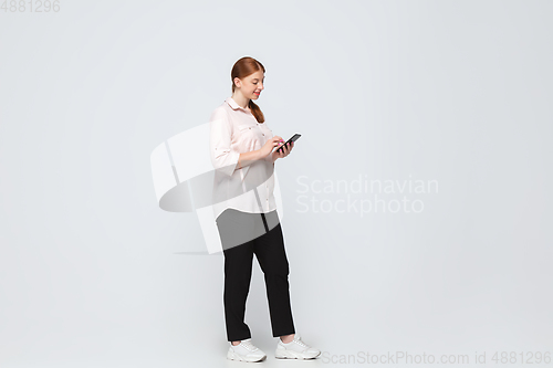 Image of Young caucasian woman in casual wear. Bodypositive female character, plus size businesswoman