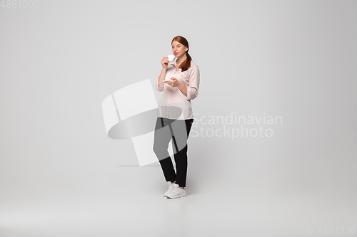 Image of Young caucasian woman in casual wear. Bodypositive female character, plus size businesswoman