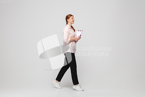 Image of Young caucasian woman in casual wear. Bodypositive female character, plus size businesswoman