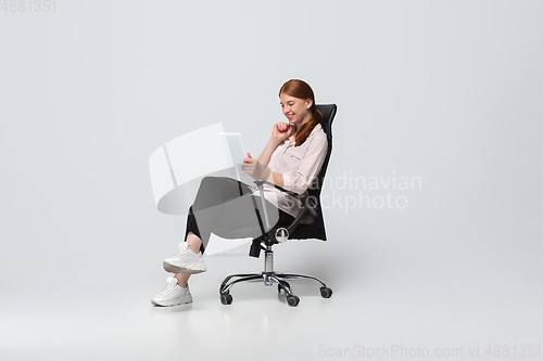 Image of Young caucasian woman in casual wear. Bodypositive female character, plus size businesswoman