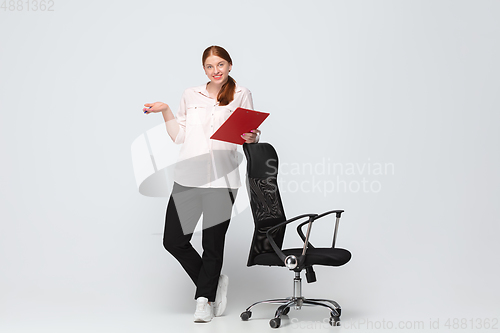 Image of Young caucasian woman in casual wear. Bodypositive female character, plus size businesswoman