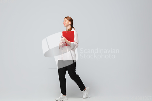 Image of Young caucasian woman in casual wear. Bodypositive female character, plus size businesswoman