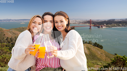 Image of women toasting drinks in san francisco