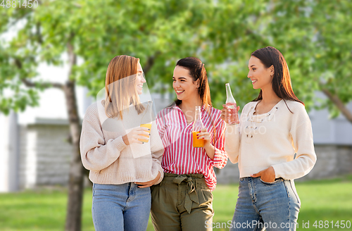 Image of young women with non alcoholic drinks talking