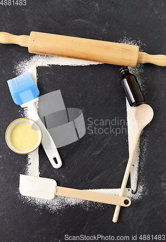 Image of frame of kitchen tools and cooking ingredients