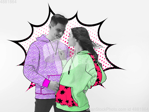 Image of Casual young stylish couple on white background with colourful art drawings in comics style