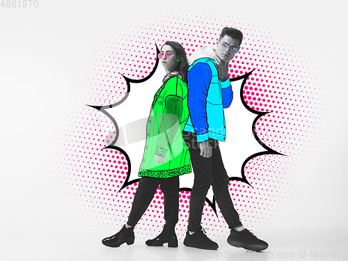 Image of Casual young stylish couple on white background with colourful art drawings in comics style
