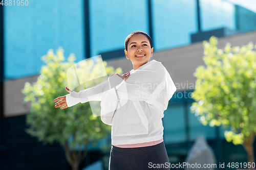 Image of african american woman doing sports outdoors