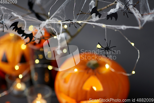 Image of pumpkins, candles and halloween decorations