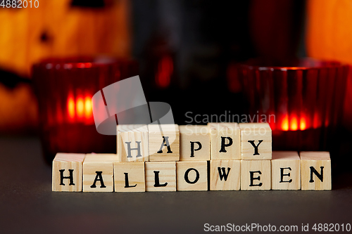 Image of wooden toy blocks with happy halloween letters